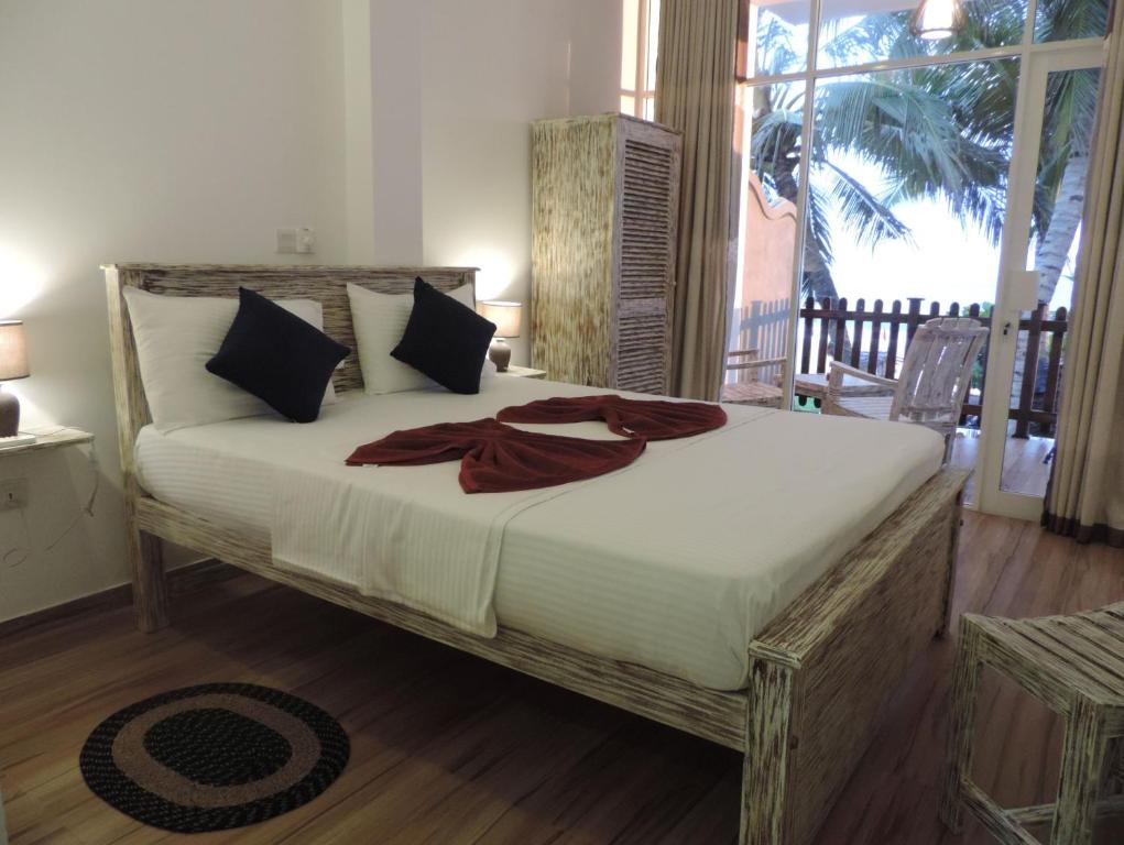 Двухместный (Номер Делюкс с кроватью размера «queen-size») гостевого дома Yula Beach, Хиккадува