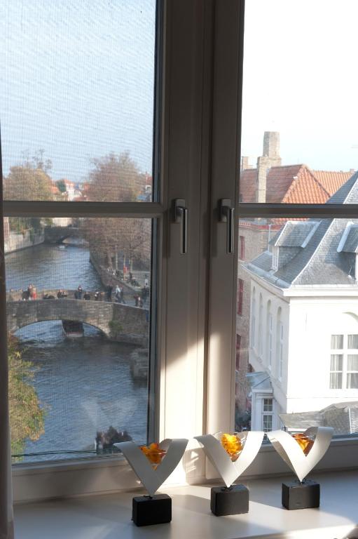 Двухместный (Бюджетный номер с видом на реку) отеля Hotel Bourgoensch Hof, Брюгге