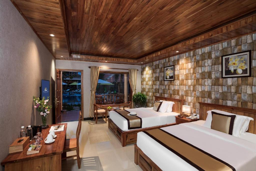 Двухместный (Двухместный номер Делюкс с 2 отдельными кроватями) курортного отеля Golden Topaz Phu Quoc Resort, Дуонг-Донг