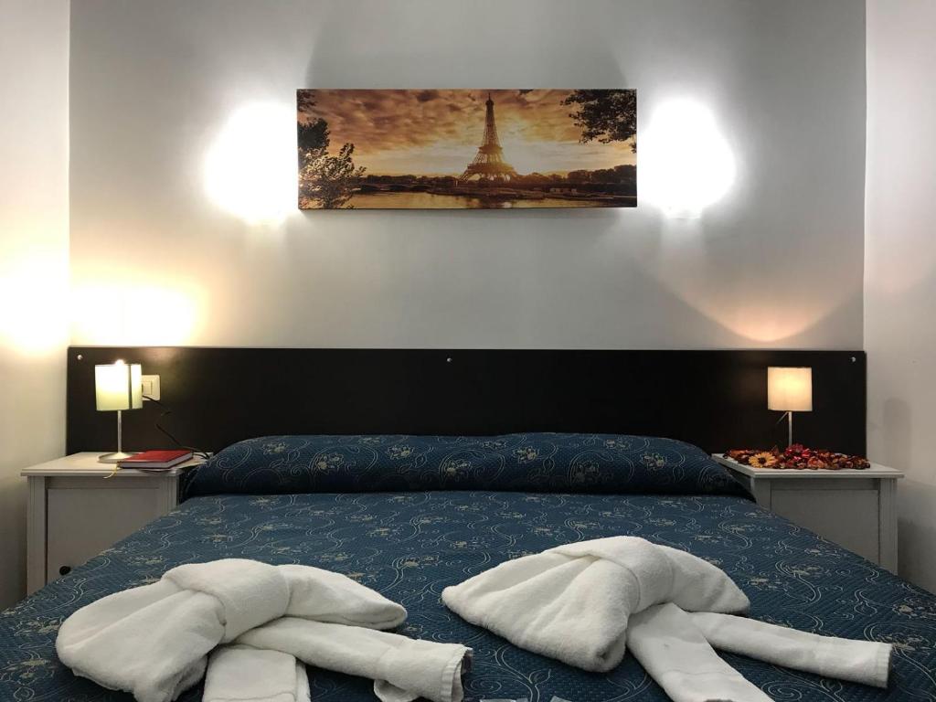 Двухместный (Двухместный номер с 1 кроватью или 2 отдельными кроватями, общая ванная комната) отеля Locanda Otello, Рим