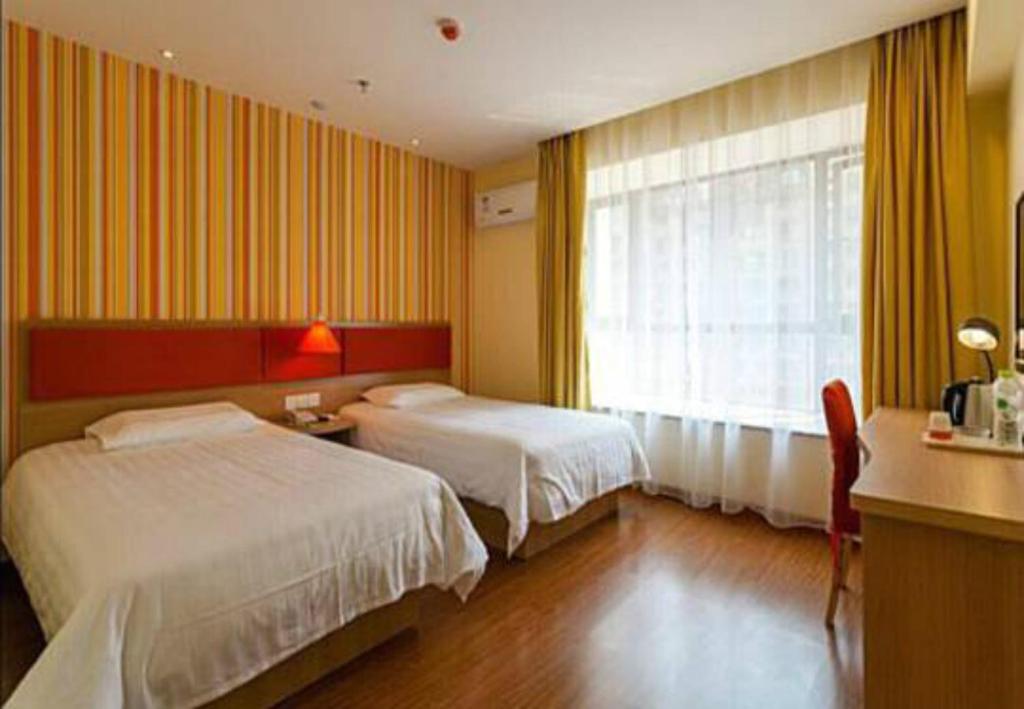 Двухместный (Стандартный двухместный номер с 2 отдельными кроватями) отеля Home Inn Nanning Langxi Guichun Road, Наньнин