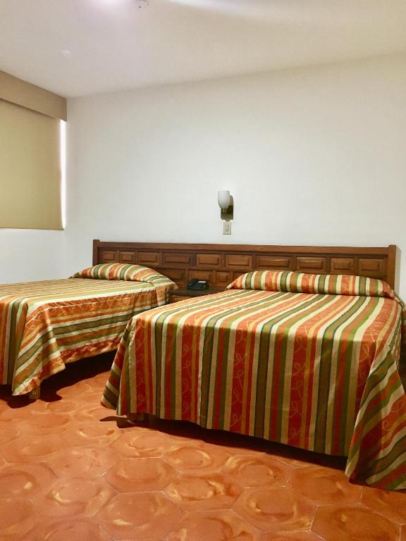 Двухместный (Двухместный номер с 2 отдельными кроватями) отеля Hotel del Valle, Кульякан