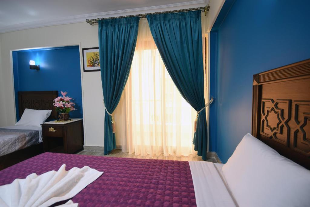 Двухместный (Двухместный номер с 1 кроватью или 2 отдельными кроватями) отеля Amin Hotel, Каир