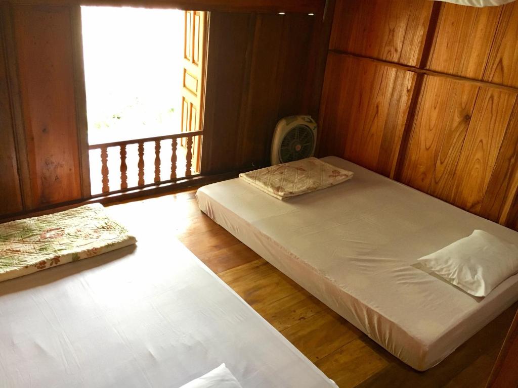 Двухместный (Двухместный номер с 2 отдельными кроватями) семейного отеля Homestay Bui Ty Ha Giang, Хазянг