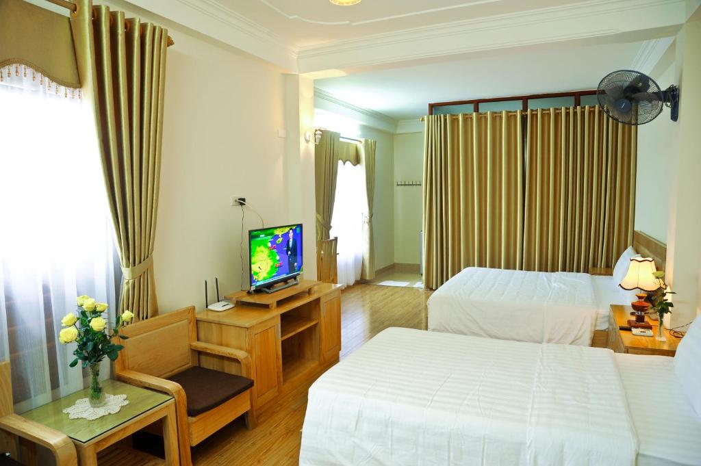 Двухместный (Улучшенный двухместный номер с 2 отдельными кроватями) семейного отеля Hoang Giang Homestay, Ниньбинь