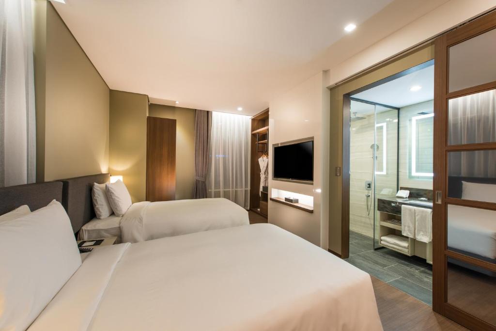 Двухместный (Двухместный номер Делюкс с 2 отдельными кроватями) отеля ENA Suite Hotel Namdaemun, Сеул