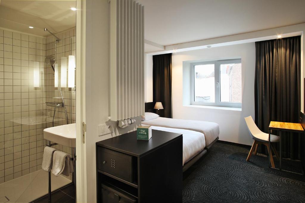 Двухместный (Двухместный номер Делюкс с 2 отдельными кроватями) отеля Van Belle Hotel, Брюссель