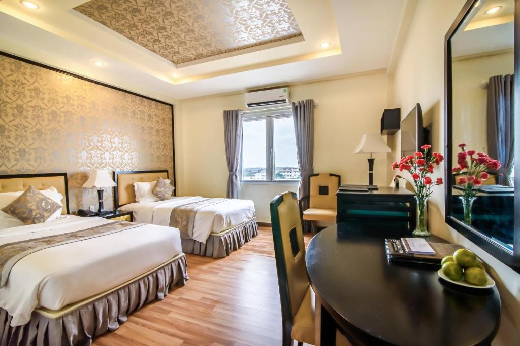Двухместный (Двухместный номер Делюкс с 2 отдельными кроватями) отеля Rosaleen Boutique Hotel, Хюэ