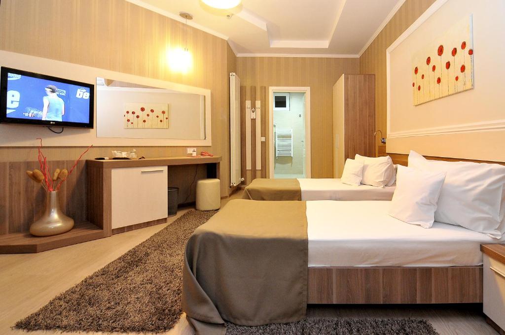 Двухместный (Двухместный номер с 2 отдельными кроватями) отеля Hotel Confort, Клуж-Напока