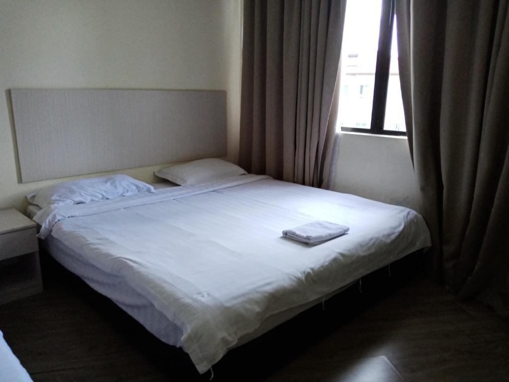 Двухместный (Улучшенный номер с кроватью размера «king-size») отеля Home Inn 2 Taman Bukit Segar, Куала-Лумпур