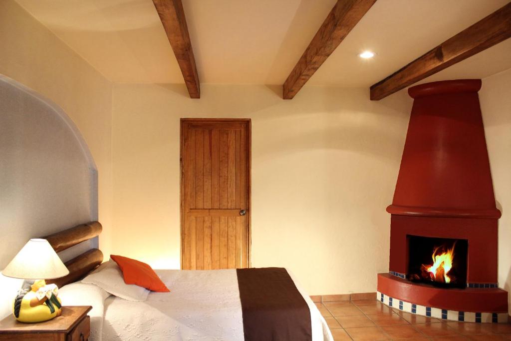 Двухместный (Двухместный номер с 2 двуспальными кроватями) отеля Hotel Posada Real Tapalpa, Тапальпа