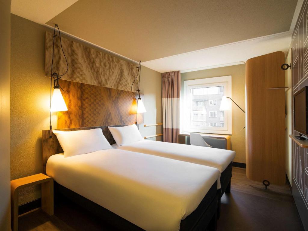 Двухместный (Стандартный двухместный номер с 2 отдельными кроватями) отеля ibis Amsterdam Centre Stopera, Амстердам