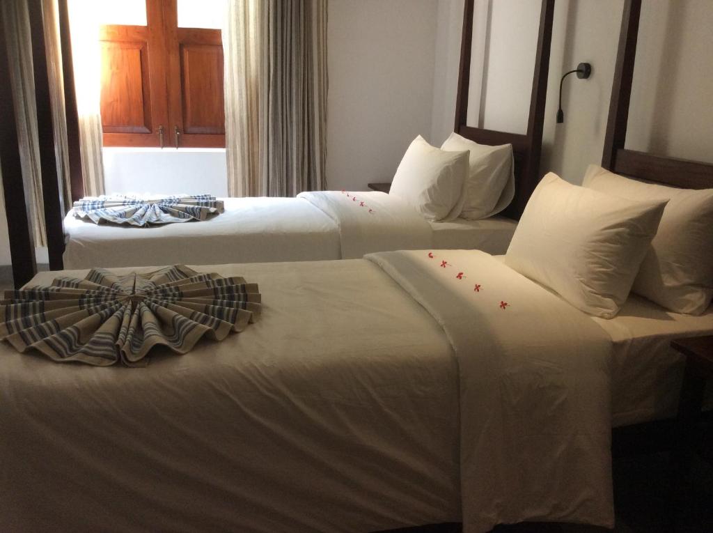 Двухместный (Стандартный двухместный номер с 2 отдельными кроватями) отеля Coza Ceylon, Дехивала-Маунт-Лавиния