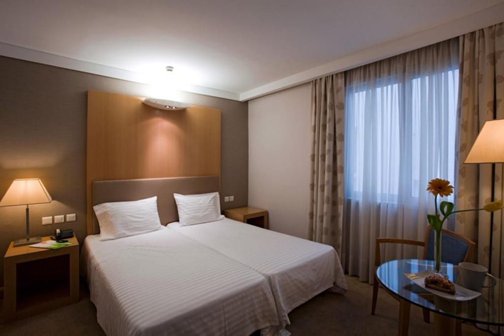 Двухместный (Улучшенный двухместный номер с 1 кроватью или 2 отдельными кроватями) отеля Central Hotel, Афины