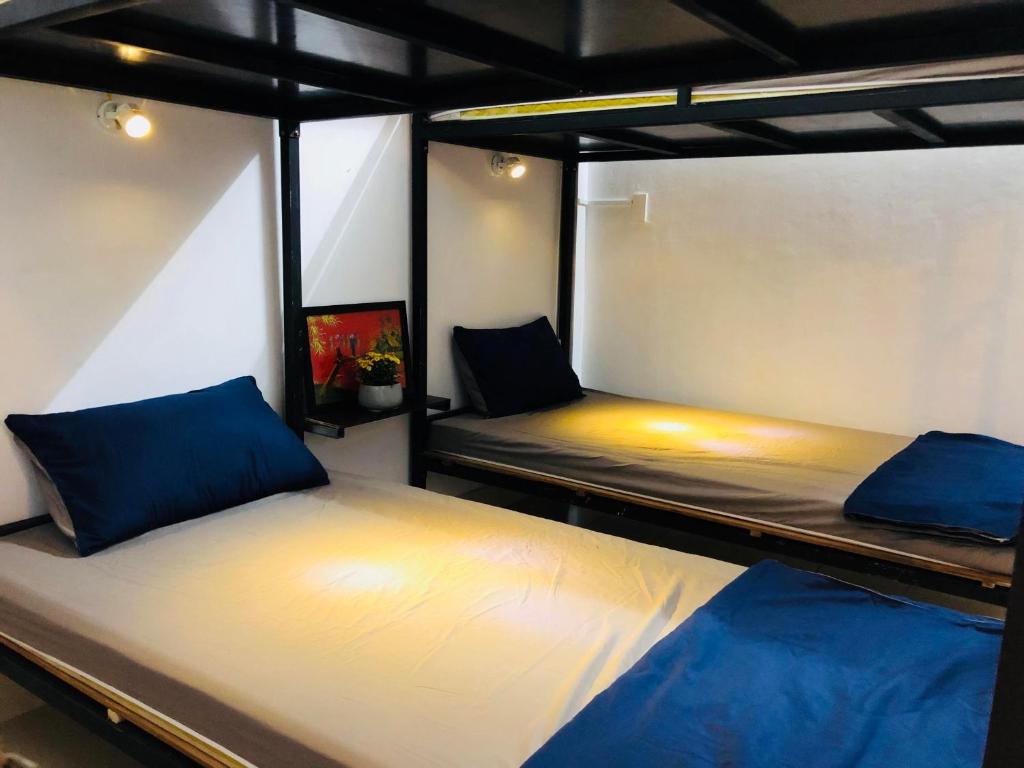 Номер (Спальное место на двухъярусной кровати в общем номере для мужчин и женщин) хостела Friendly House Hostel, Хюэ