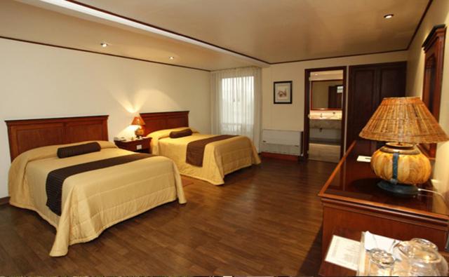 Трехместный (Трехместный номер) отеля Suites Colibri, Оахака-де-Хуарес