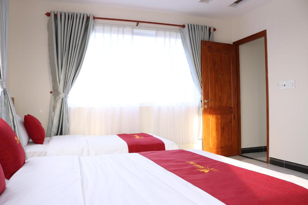 Трехместный (Трехместный номер Делюкс) отеля Hoang Phuc Hotel, Хошимин