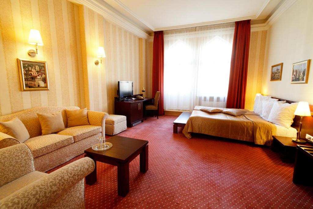 Двухместный (Полулюкс с большой двуспальной кроватью) отеля Monika Centrum Hotels, Рига