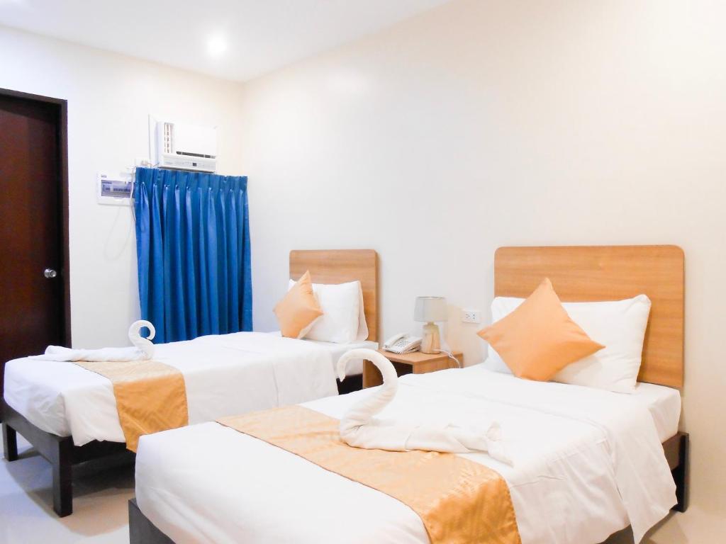 Двухместный (Стандартный двухместный номер с 1 кроватью или 2 отдельными кроватями) отеля Rublin Hotel Cebu, Себу