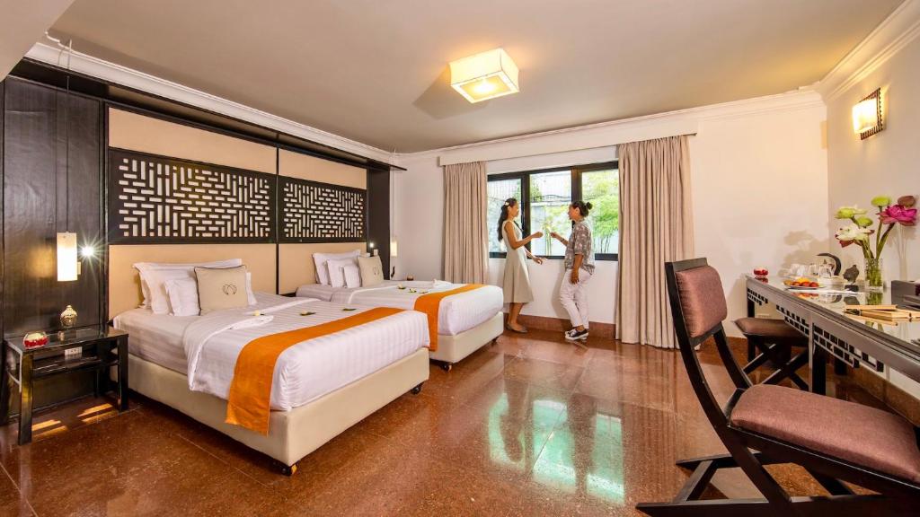 Двухместный (Двухместный номер Делюкс с 2 отдельными кроватями) отеля White Mansion Legend 白色公馆, Пномпень