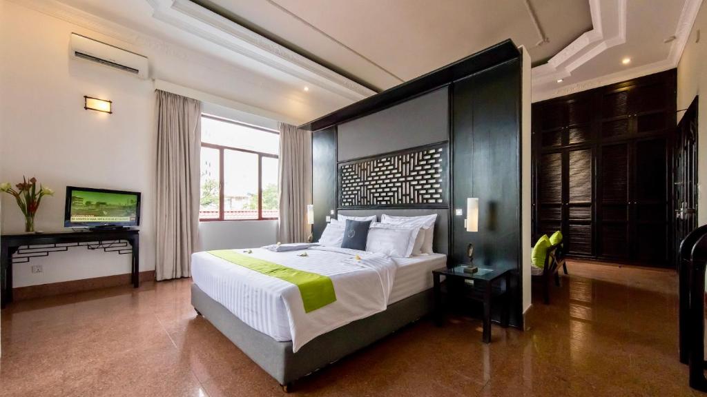Сьюит (WM Suite King bed) отеля White Mansion Legend 白色公馆, Пномпень
