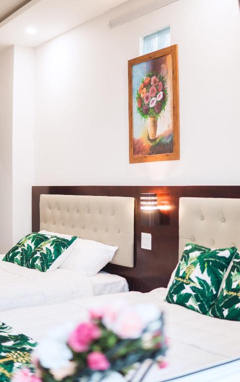 Двухместный (Двухместный номер Делюкс с 2 отдельными кроватями) отеля Flora Quy Nhon Hotel, Куинён
