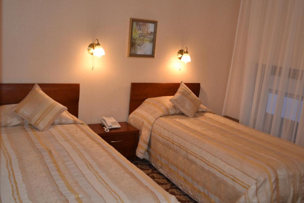 Двухместный (Двухместный номер с 2 отдельными кроватями) отеля Gilija, Шилуте