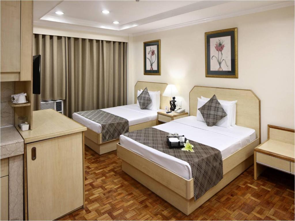 Двухместный (Deluxe Double or Twin Room - Quarantine Room) отеля Manila Lotus Hotel, Манила