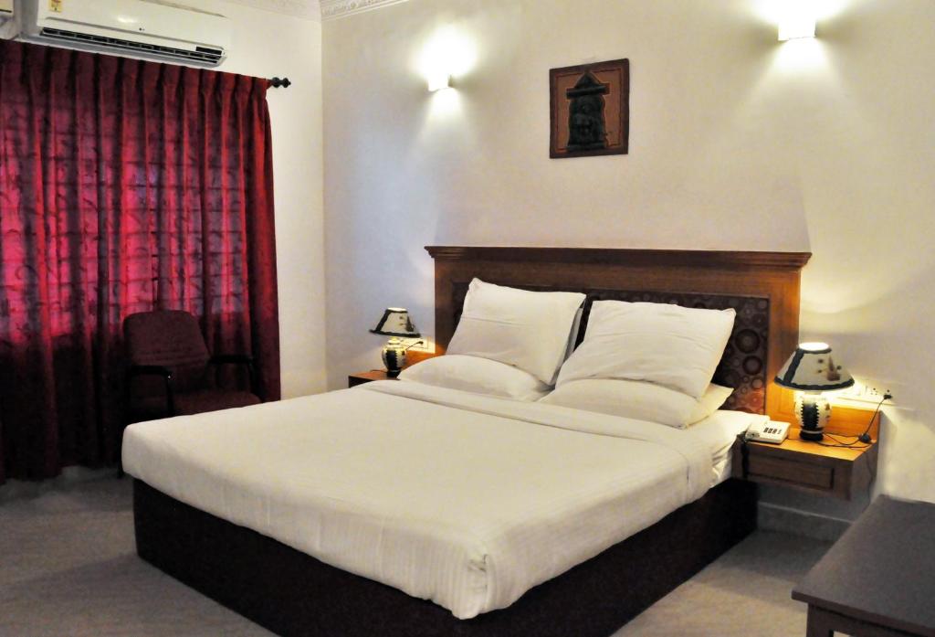 Двухместный (Двухместный номер с 1 кроватью или 2 отдельными кроватями и вентилятором) курортного отеля Radiant Resort, Бангалор