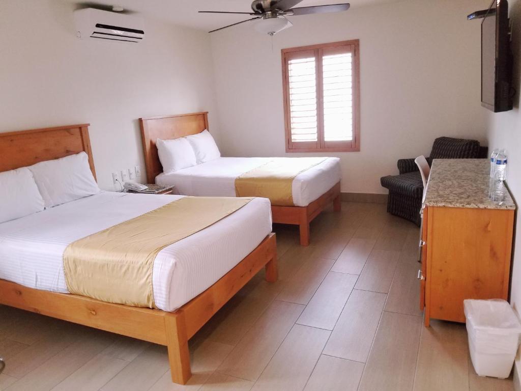 Двухместный (Двухместный номер с 2 отдельными кроватями) отеля Hotel Quinta, Тихуана