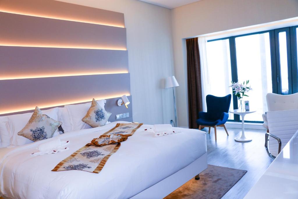 Двухместный (Улучшенный двухместный номер с 1 кроватью или 2 отдельными кроватями) отеля Sanya Phoenix Airport Hotel, Санья