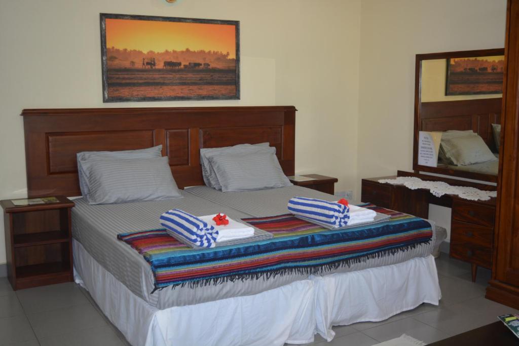 Двухместный (Двухместный номер Делюкс с 2 отдельными кроватями) гостевого дома Janishi Residencies, Негомбо