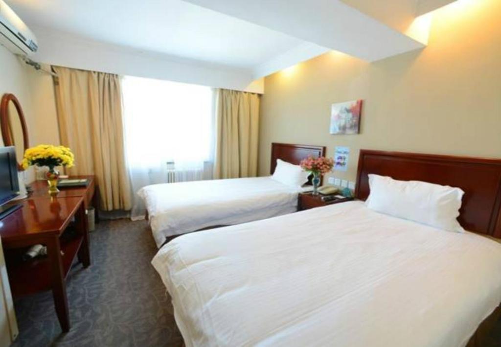 Двухместный (Для граждан материковой части Китая — Стандартный двухместный номер с 2 отдельными кроватями) отеля GreenTree Inn Nanning Xiuxiang Branch, Наньнин