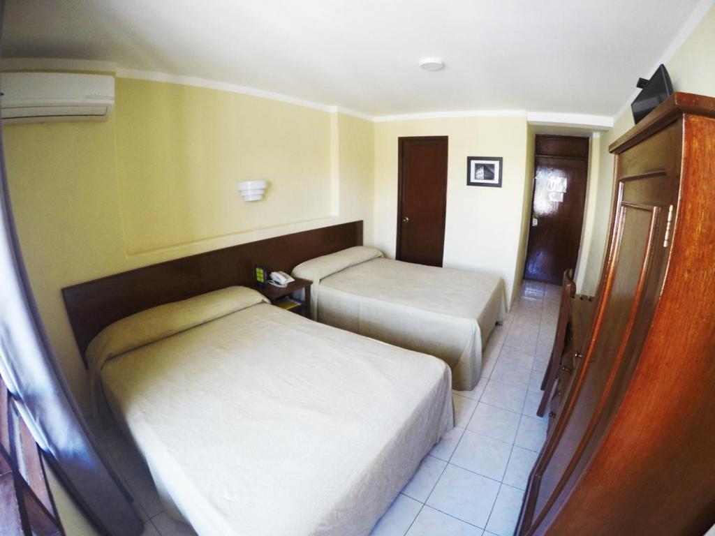 Двухместный (Двухместный номер с 2 двуспальными кроватями) отеля Hotel & Suites Oriente, Веракрус