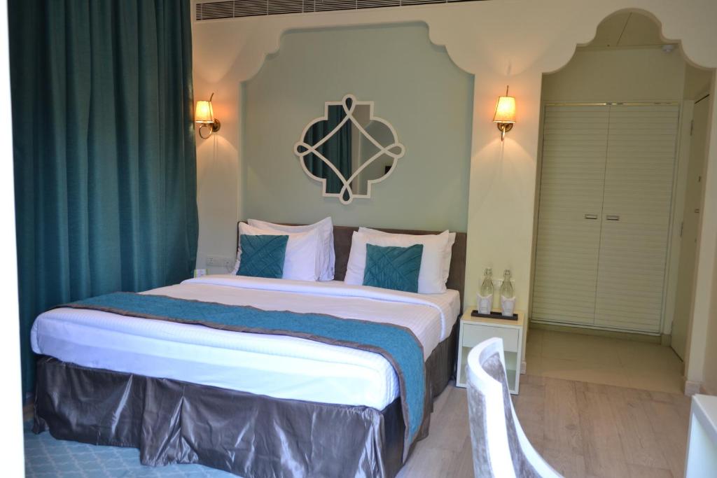 Двухместный (Двухместный номер Делюкс с 1 кроватью или 2 отдельными кроватями) курортного отеля Ibiza The Fern Resort & Spa, Kolkata, Калькутта