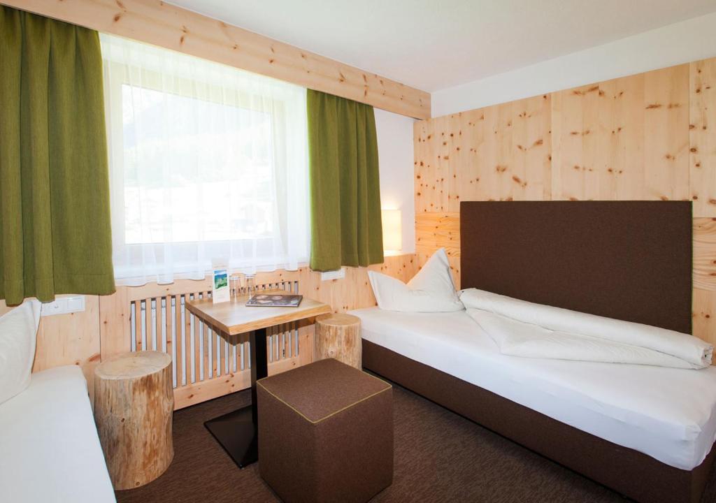 Двухместный (Двухместный номер с 2 отдельными кроватями) гостевого дома Gästehaus Franz Riml, Зёльден