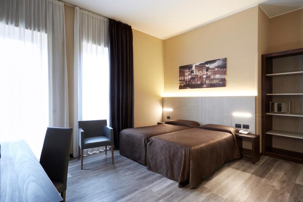 Двухместный (Двухместный номер с 2 отдельными кроватями) отеля Hotel Ritter, Милан