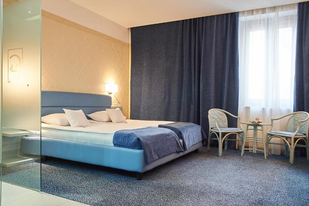 Двухместный (Стандартный двухместный номер с 2 отдельными кроватями) отеля Continental Forum Sibiu, Сибиу