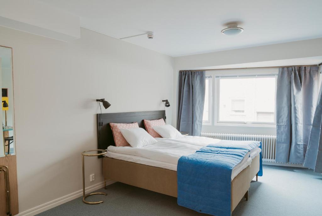Двухместный (Улучшенный двухместный номер с 2 отдельными кроватями) отеля 2Home Hotel Gävle, Евле
