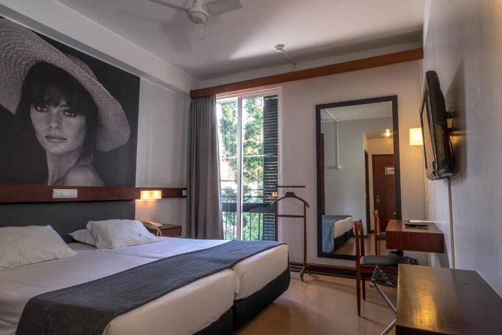 Двухместный (Стандартный двухместный номер с 1 кроватью или 2 отдельными кроватями) отеля Hotel do Carmo, Фуншал