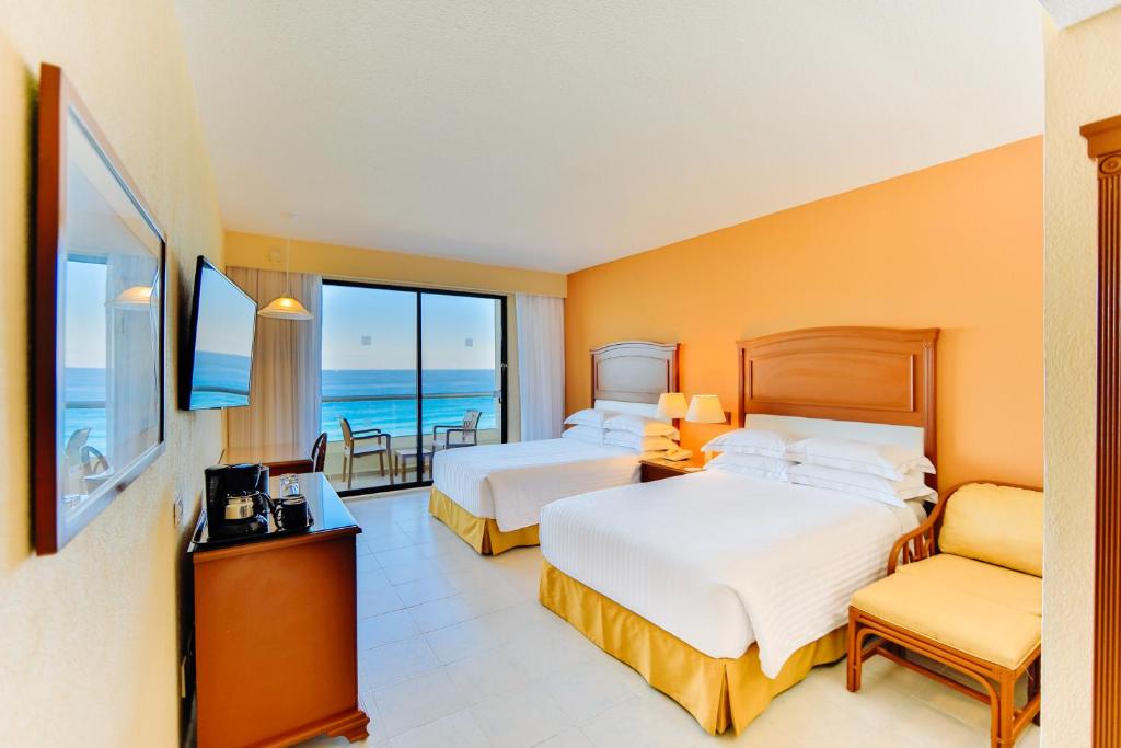 Двухместный (Двухместный номер Premium Level с 1 кроватью, рядом с океаном (для 2 взрослых и 1 ребенка)) курортного отеля Occidental Tucancún, Канкун