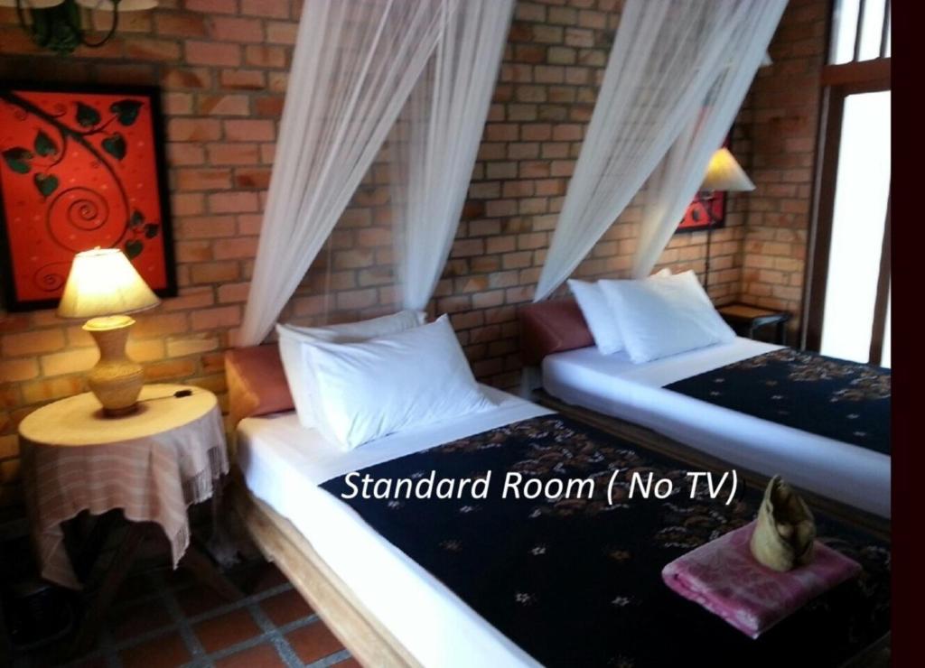 Двухместный (Стандартный двухместный номер с 2 отдельными кроватями) курортного отеля Seapines Villa Liberg, Пхукет