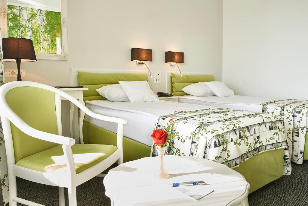 Двухместный (Двухместный номер Делюкс с 2 отдельными кроватями) отеля Continental Forum Oradea, Орадя