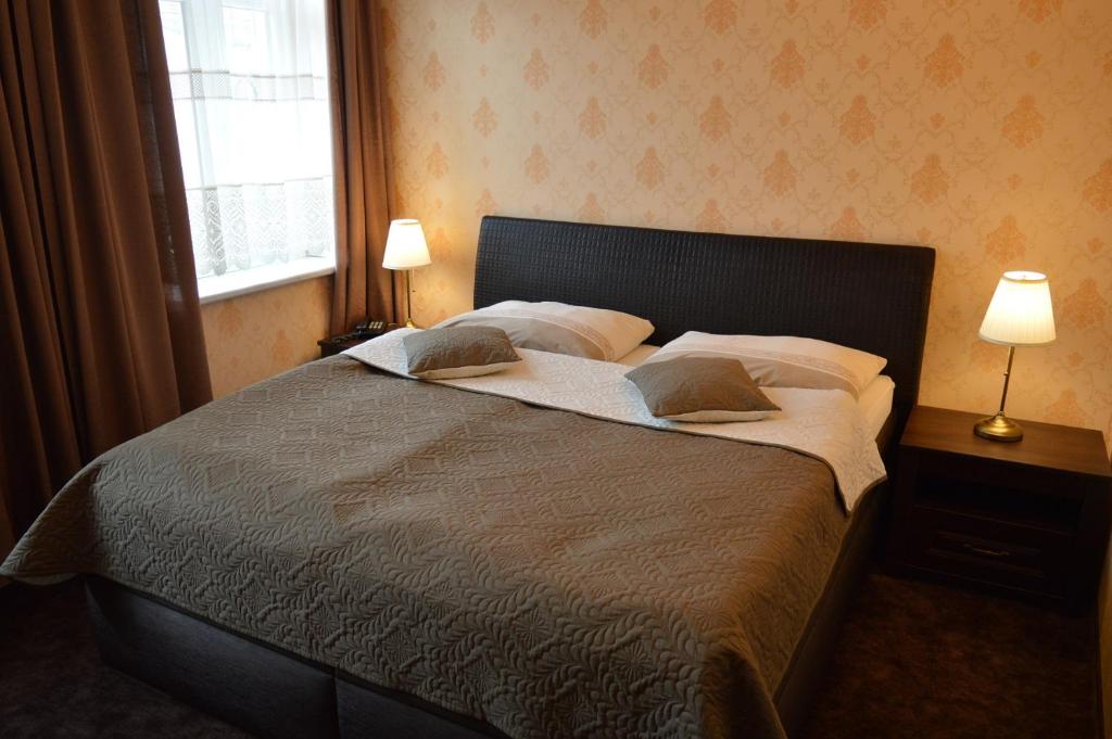 Двухместный (Классический двухместный номер с 1 кроватью или 2 отдельными кроватями) отеля Hotel Lipa, Бойнице