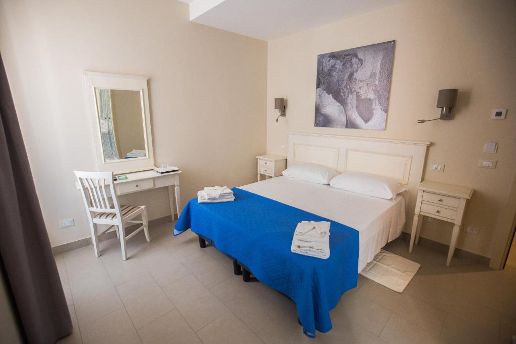 Двухместный (Двухместный номер с 1 кроватью или 2 отдельными кроватями - В отдельном здании) отеля Hotel Grifo, Рим