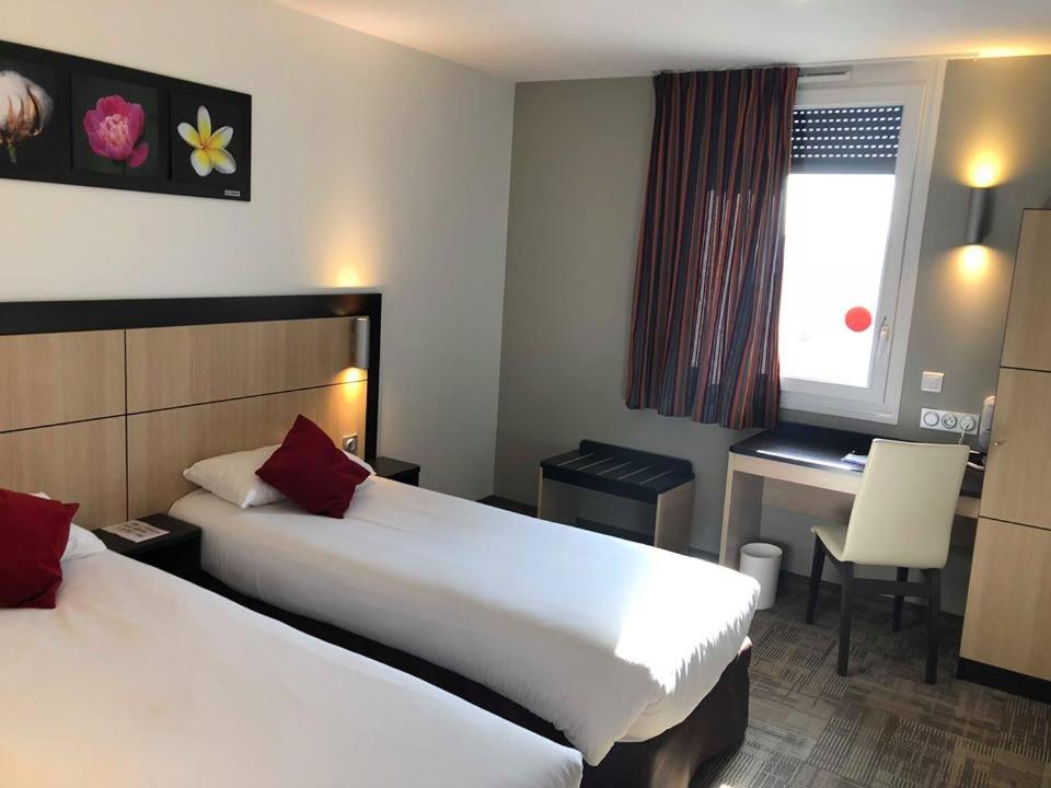 Двухместный (Двухместный номер с 2 отдельными кроватями) отеля Akena City Reims Bezannes, Реймс