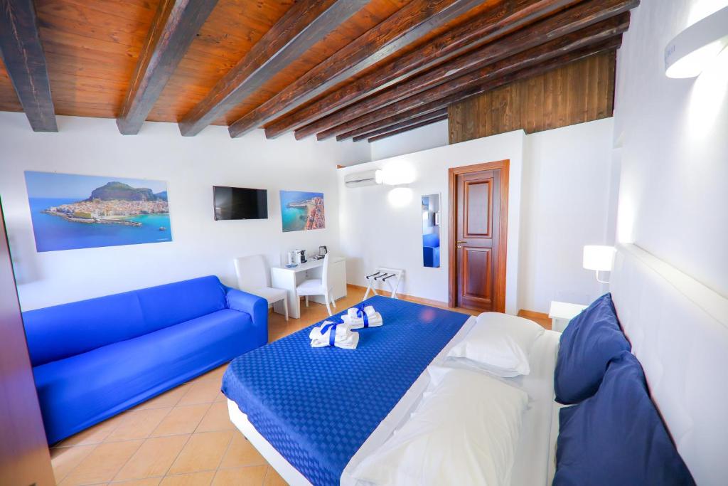 Трехместный (Улучшенный трехместный номер с видом на море) гостевого дома Cefalu in Blu, Чефалу