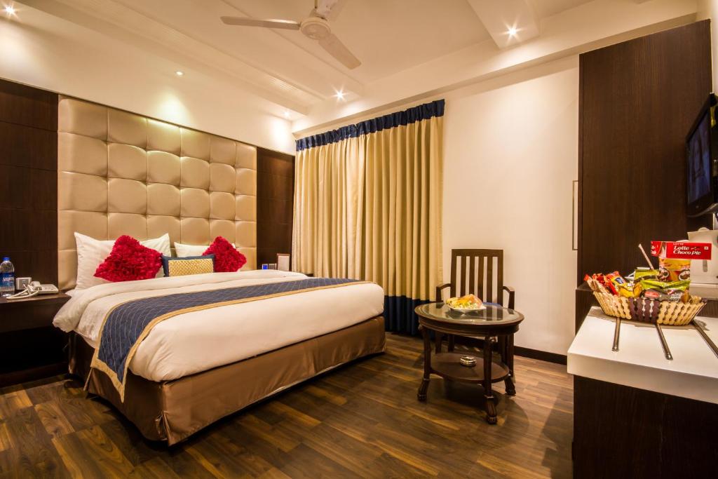 Трехместный (Стандартный трехместный номер) отеля Grand Godwin, Нью-Дели