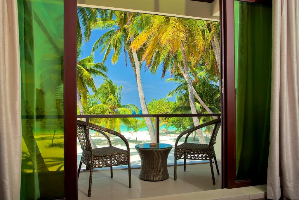 Двухместный (Номер «Пляж» Делюкс по сниженной цене - Бесплатный трансфер - Бесплатная экскурсия и наблюдение за дельфинами) гостевого дома Kaani Beach Hotel, Маафуши