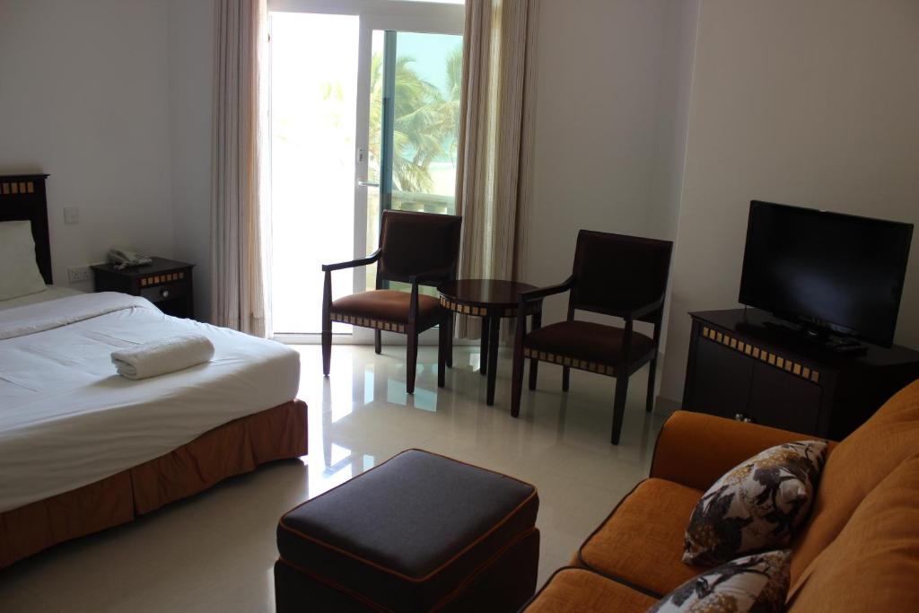 Двухместный (Двухместный номер Делюкс с 2 отдельными кроватями и видом на море) курортного отеля Beach Resort Salalah, Салала